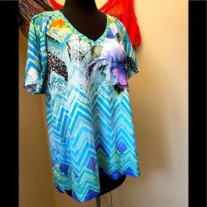 Tshirt with flowers, graphic design, and beads